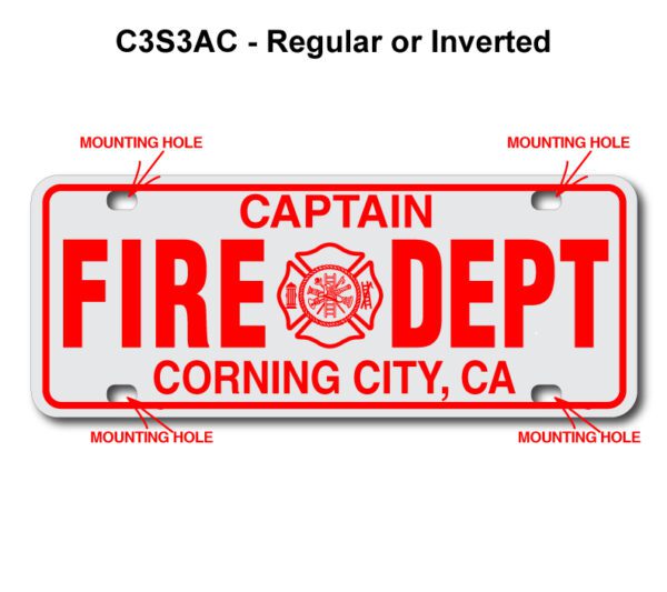 A red and white license plate with the names of fire department members.