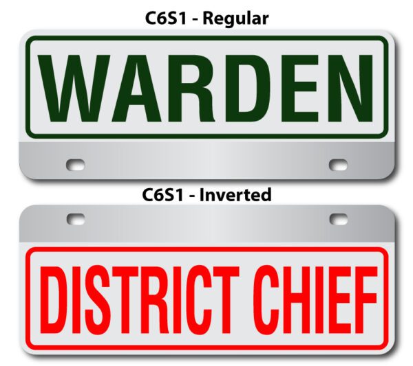 A red and green sign with the words " warden " and " district chief ".