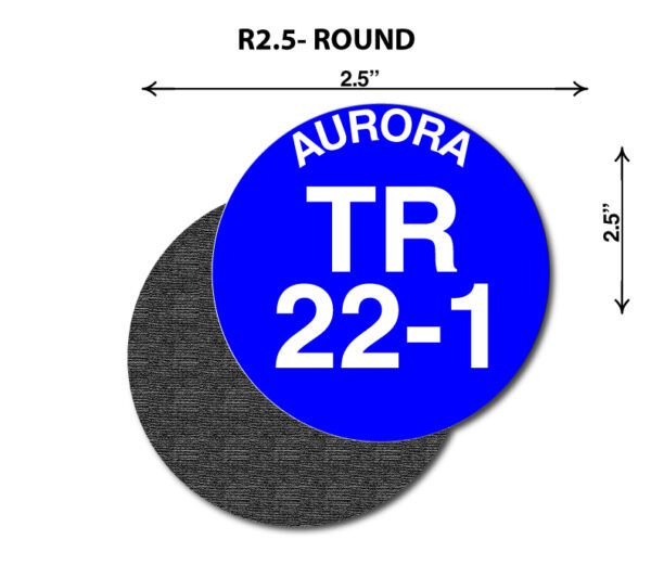 A round sticker with the words " aurora tr 2 2-1 ".