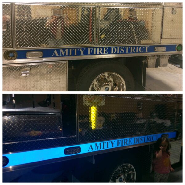 Amity Fire District truck with blue stripe.