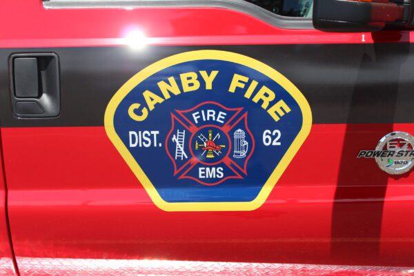 Canby Fire Department logo on red truck.